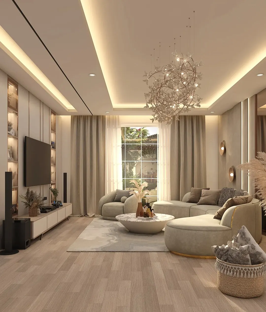 Modern living room interior with cove lighting, designer chandelier and curved sofa by Sri Siddhi Infra and Interiors